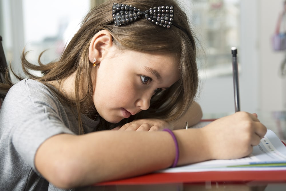 Young Girl Writing